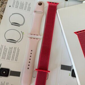 4S original iWatch wrist bands. One (in salmon) is New in box